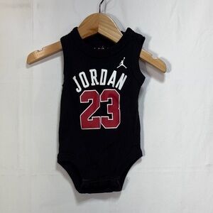 🧇 Jordan Black Onesie with Red and White Accents